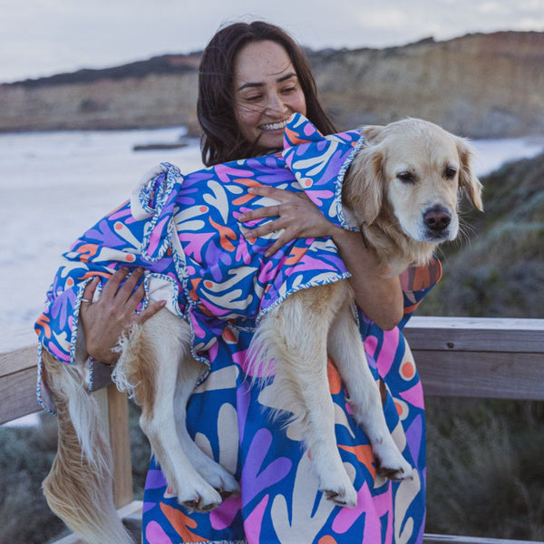Matching for dogs and people - wet dog surf ponchos.